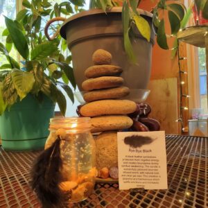 Bye bye Black river rock candle scented with lavender